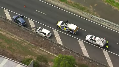 Man critically injured after being hit outside car on Logan Motorway