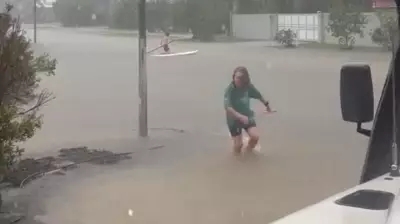 Mission Beach Cut Off by Monsoon Deluge, Kayaks Used on Flooded Roads
