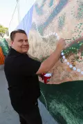 Local Noongar Artist Rohin Kickett Transforms Maddington Underpass with River Mural