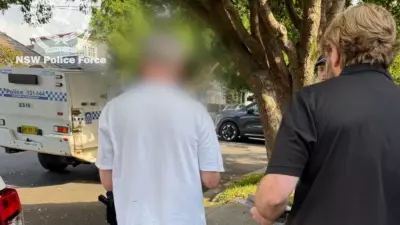 Sydney teacher, 63, charged over alleged plot to sexually assault children