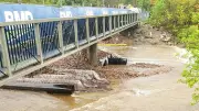 Sooning Street Bridge repairs washed into Nelly Bay in fresh setback