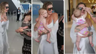 Kesha's Perth Arrival: Pop Star Greets Fans and Cuddles Baby Ahead of Claremont Show