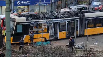 Two dead, dozens injured as Milan tram derails and crashes into building