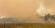 Fire Continues to Burn Near Pacific Highway in Myall Lakes National Park