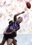 Fremantle Dockers' Brennan Cox Ruled Out of Geelong Clash, Captain Pearce Set to Play