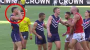 Fremantle's Pat Voss Taunts Melbourne's Harrison Petty with Crying Gesture