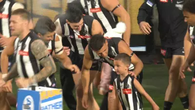 Adelaide Legend's Son Runs Out in Rival Collingwood Colours with Nick Daicos