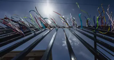 Clergy Abuse Survivors Hold Ribbon Fence Ceremony at Trinity College