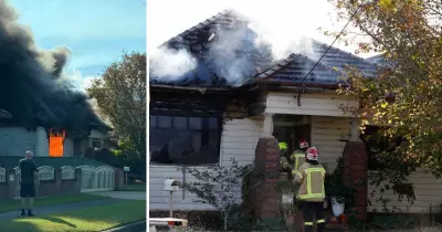 Firefighters battle 'significant' house fire in Wollongong, man hospitalised