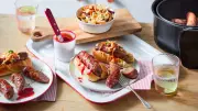 Chef Michael Weldon Elevates Footy Food with Giant Gather Round Hot Dogs