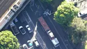 Crane Collapses on Busy Sydney Street, Causes Major Peak Hour Traffic Delays
