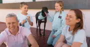 Family Adopts Greyhound After Decade-Long Wait at Record Adoption Day