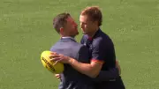 Jordan Dawson shares emotional embrace with Joel Selwood before Crows loss