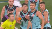 Port Adelaide's Zak Butters Faces Report for Alleged Umpire Abuse in Saints Clash