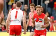 Sydney Swans Overcome Wastefulness to Topple Gold Coast and Claim AFL Ladder Lead