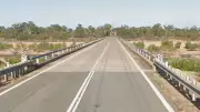Truck Driver Unharmed After B-Double Overturns on Flinders Highway