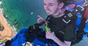Wollongong skydive: Brave Toby Holt jumps 13,000 feet despite Huntington's
