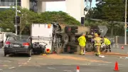 Woman Critical After Truck and Car Collision at Gold Coast Intersection