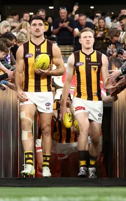 Hawks co-captains firm to face Dockers after light training session