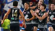 Carlton Triumphs Under Interim Coach Fraser, Defeats Bulldogs