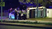 Unoccupied ute crashes into fence and garden after sedan collision in Guildford