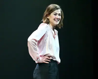 Rosamund Pike stays calm after phone alarm disrupts theatre performance