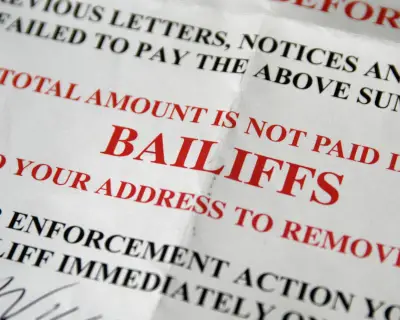 UK Government Accused of Stalling on Mandatory Bailiff Regulation