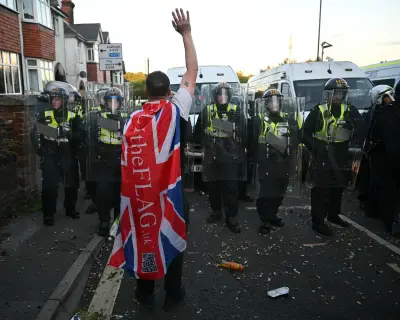UK Minister Criticises Anti-Discrimination Police Guidance Amid Protests