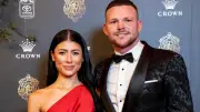AFL star's partner sues Melbourne FC over privacy breach allegations