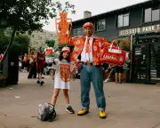 Arsenal Fans Showcase Unique Styles at Premier League Title Parade