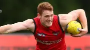 Essendon defender Lewis Hayes ruptures ACL again in comeback game