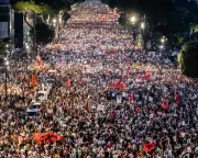 Global Photos: Bosphorus Dolphins, Protests, and Sports Highlights