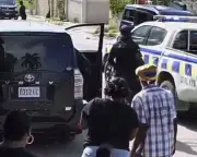 Jamaican police officer charged with murder after shooting woman at protest