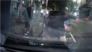 Manhunt for attackers who broke student's jaw in Melbourne CBD