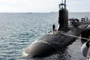 Minister defends secondhand Aukus submarine deal as cheaper option