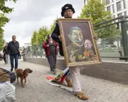 Russian Artist and Putin Critic Shot Dead in Poland