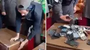 Taliban Bans Smartphones, Officials Seen Destroying Devices