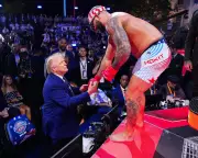 Trump Faces Pressure to Condemn UFC Fighter for Slur Against Michelle Obama