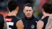 Collingwood coach McRae backs players' protection after brawl charges